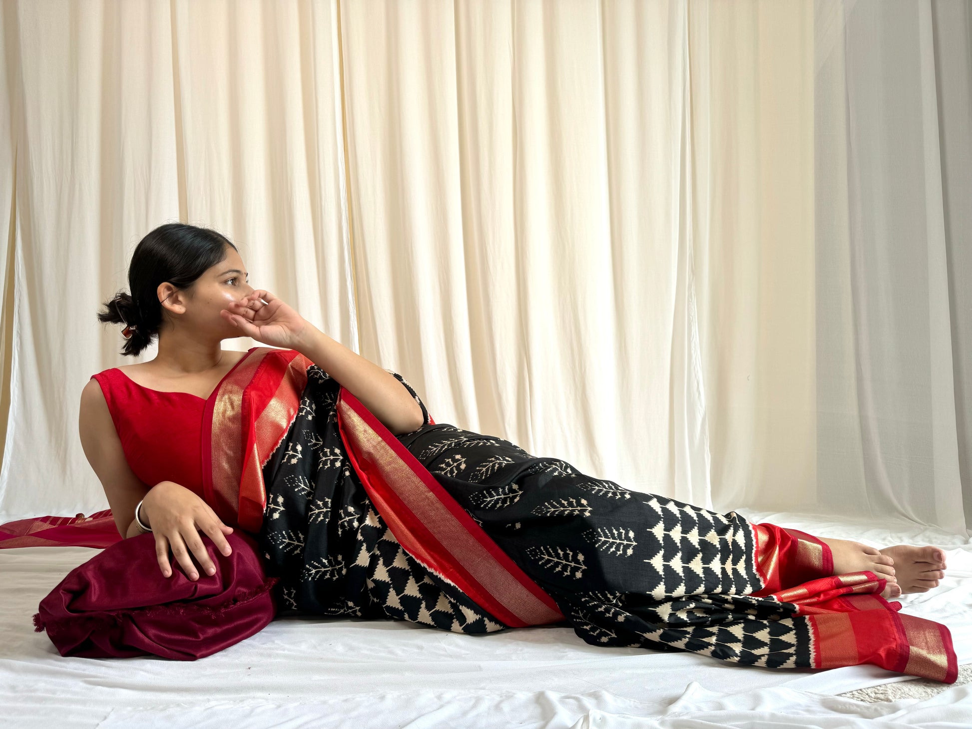 Black and red saree combination