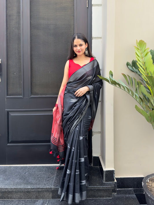 Black saree with deep red border