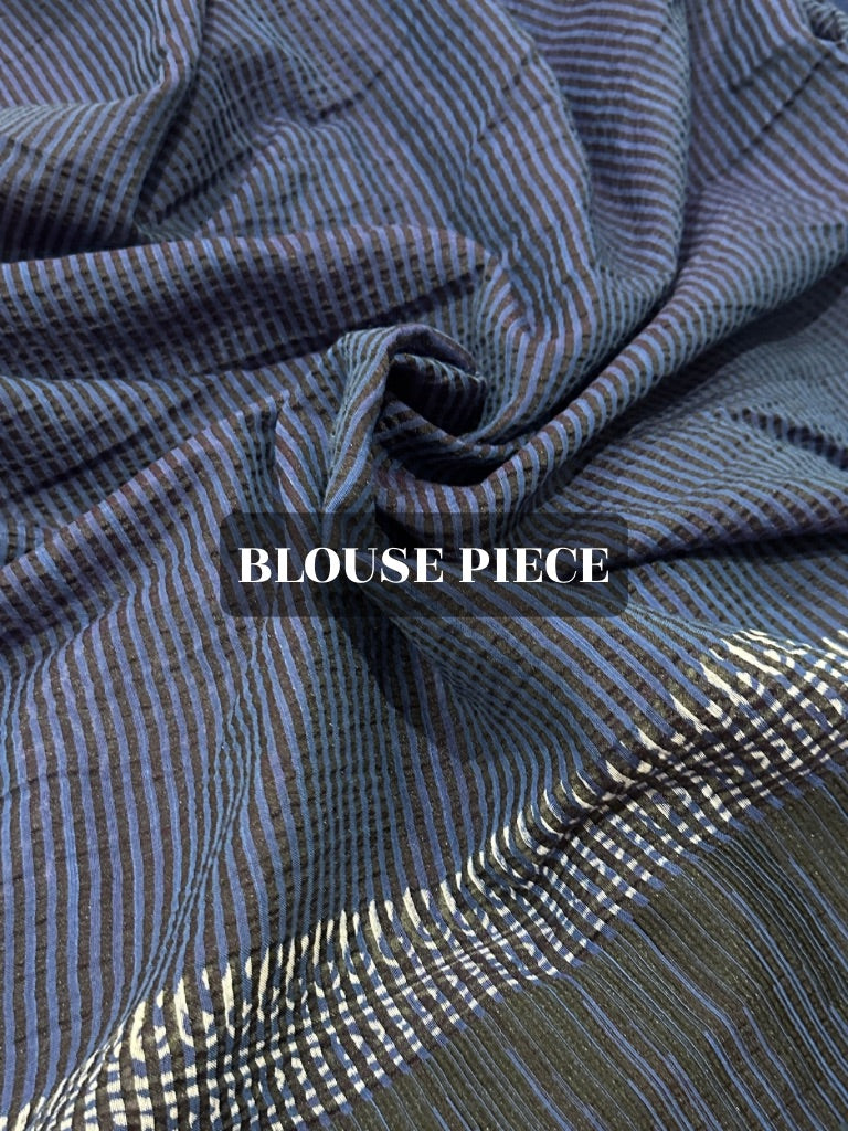 Close-up of a blue and white striped blouse piece with 'BLOUSE PIECE' text.