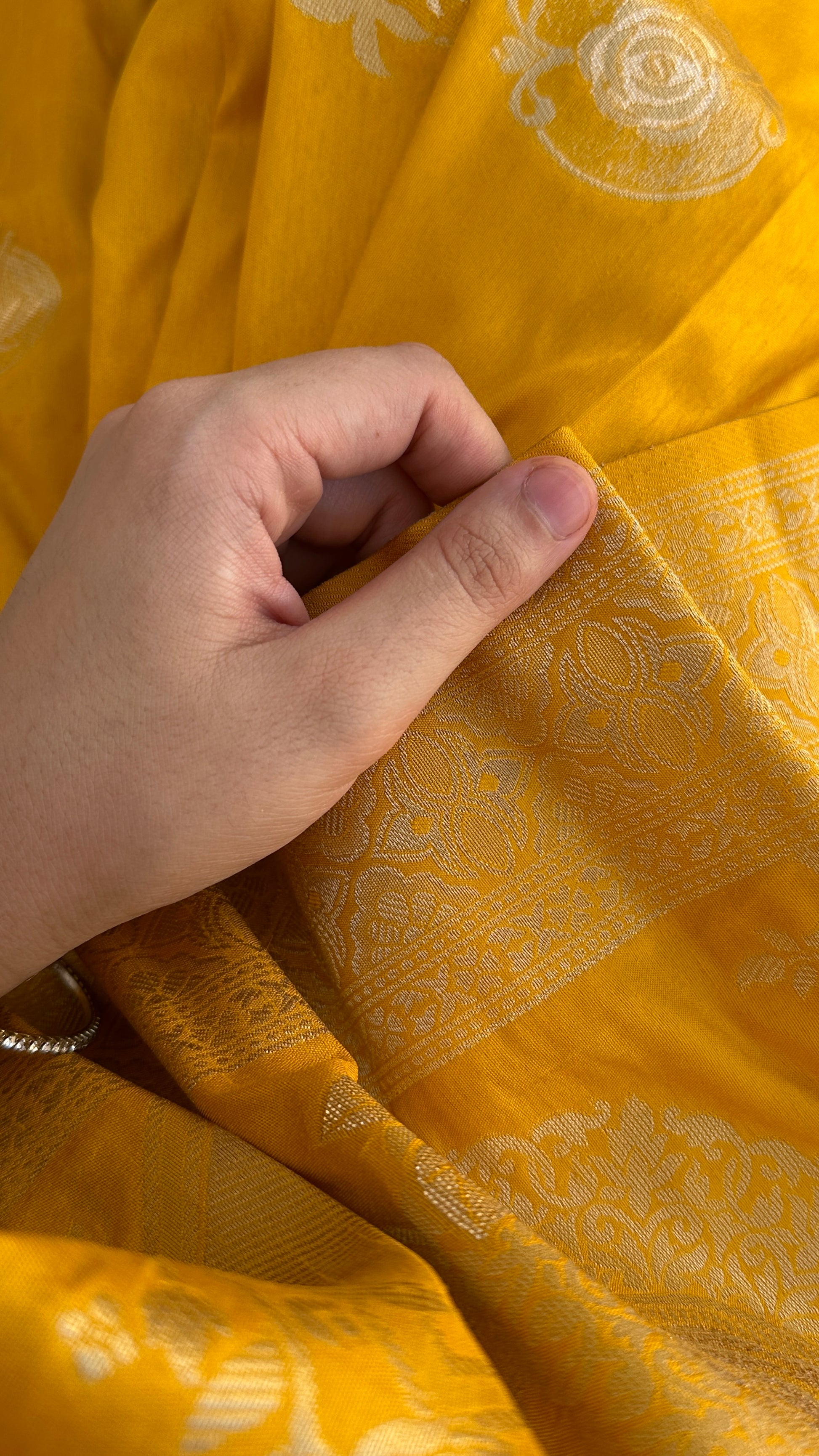 Bright yellow silk saree