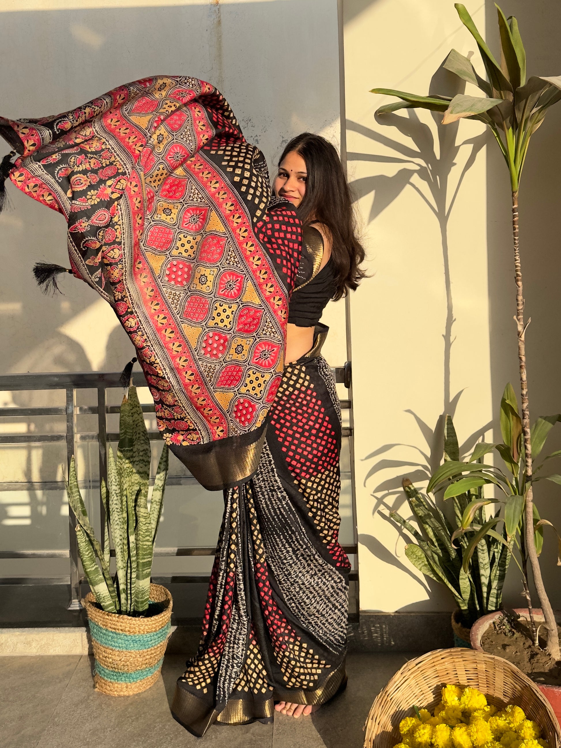 Noor-e-Qala black bandhej saree 