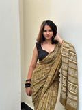 Olive green saree with elephant motifs