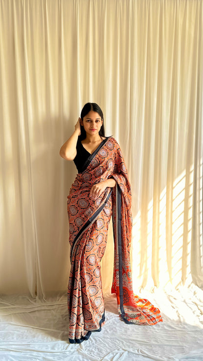 Orange Ajrakh print saree