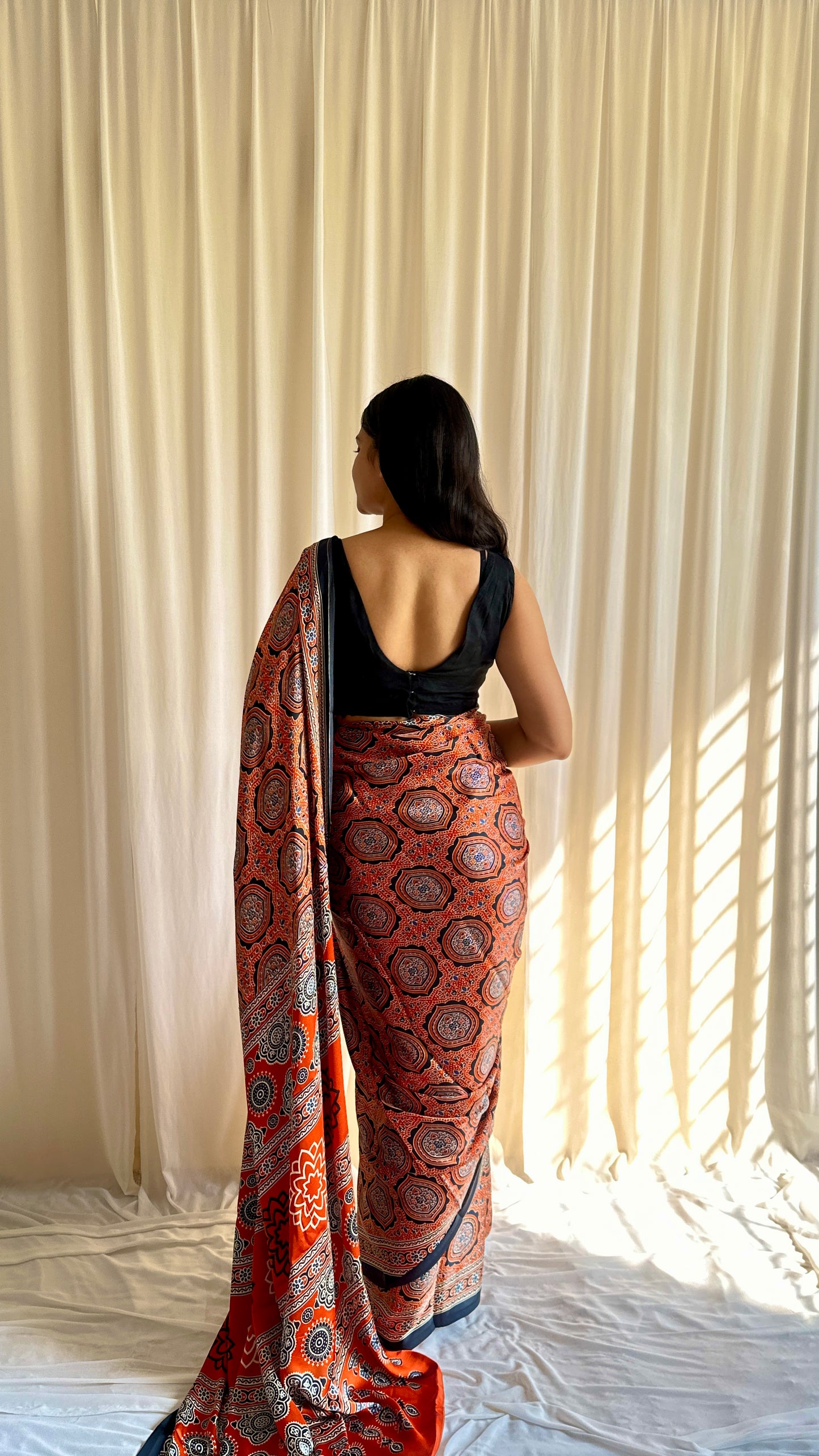 Orange saree Ajrakh print