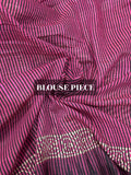 Close-up of pink and black striped fabric with 'BLOUSE PIECE' text overlay.