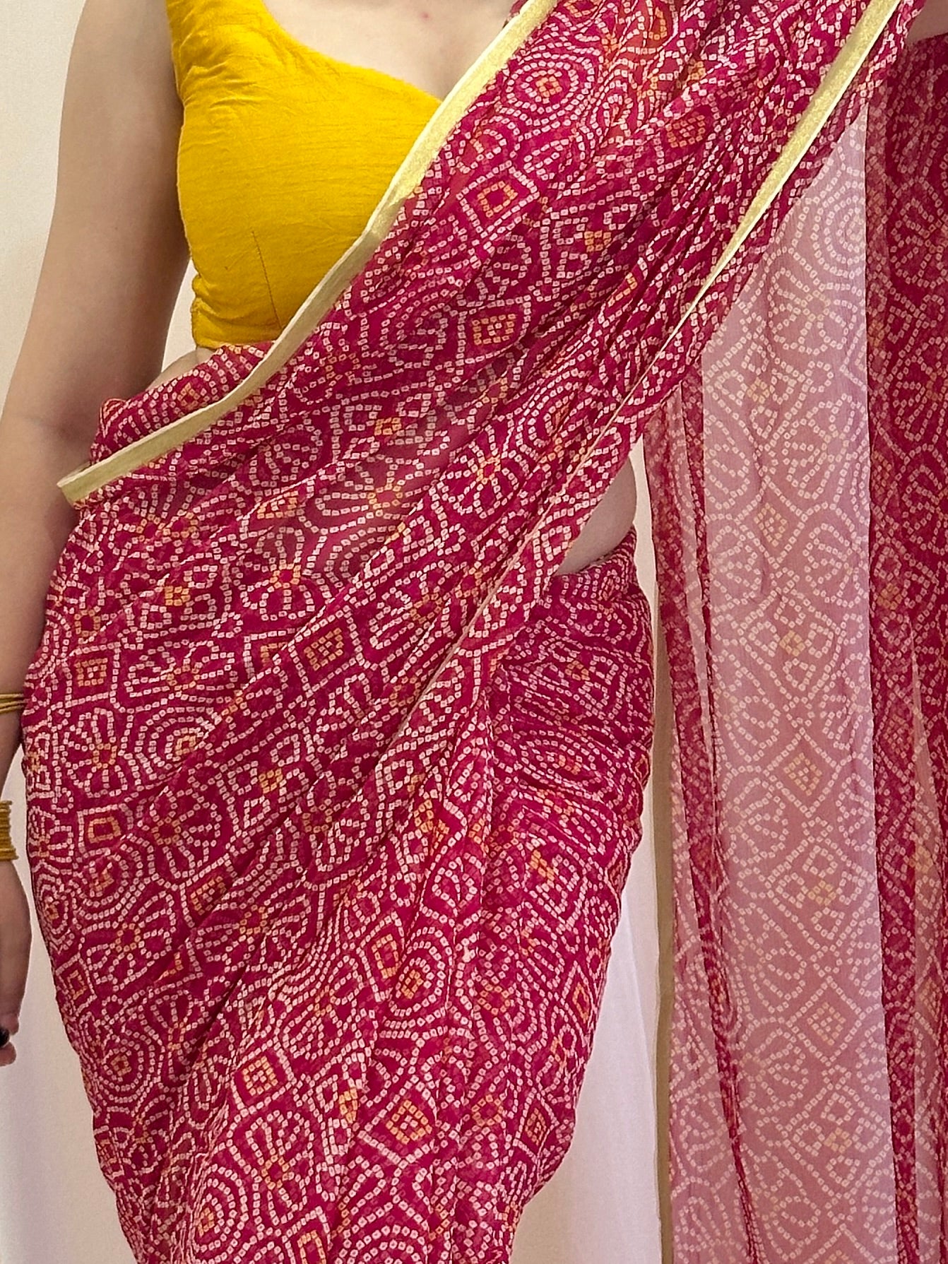 Vibrant red bandhej saree