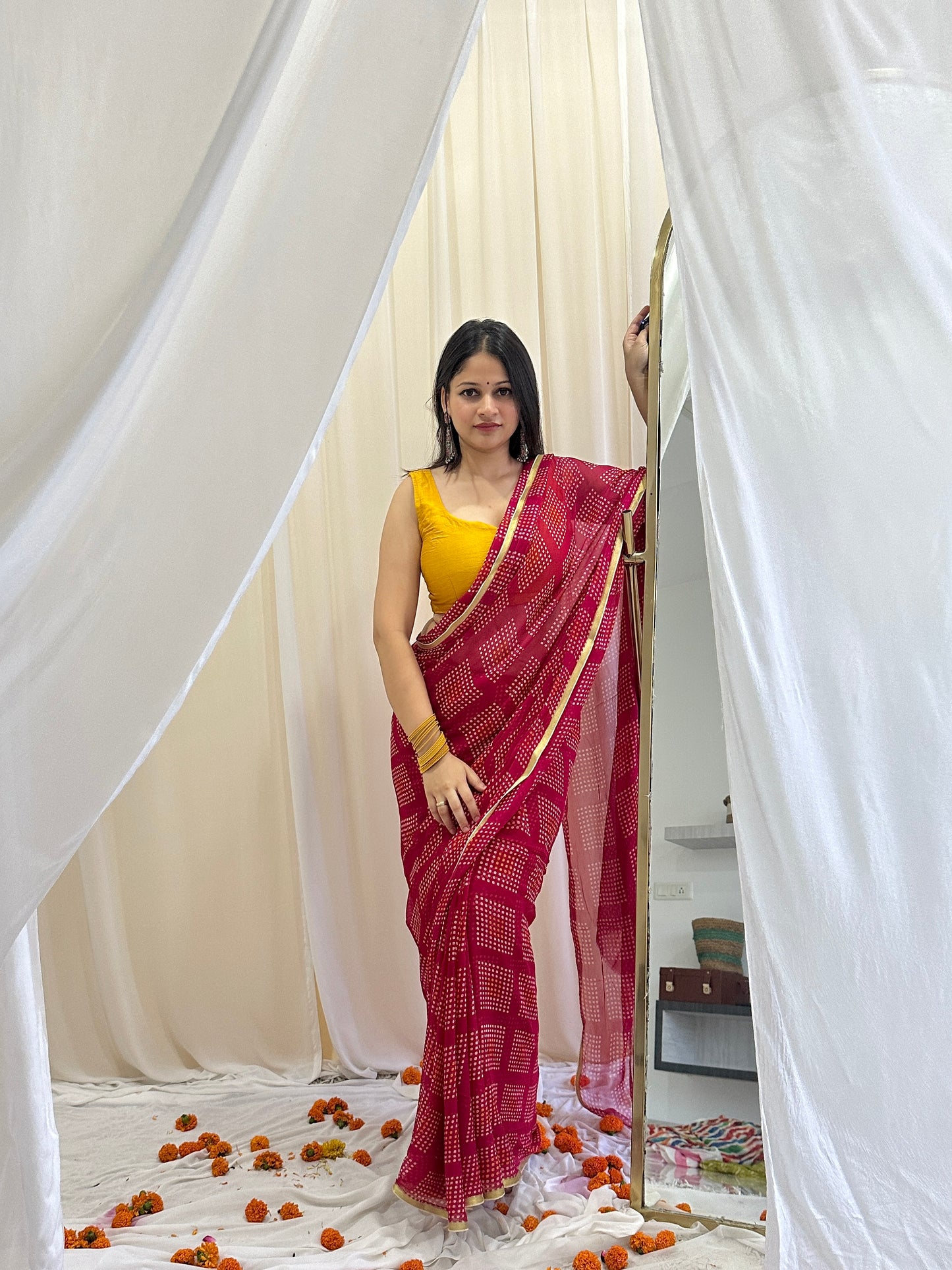 Woman in red & yellow saree 
