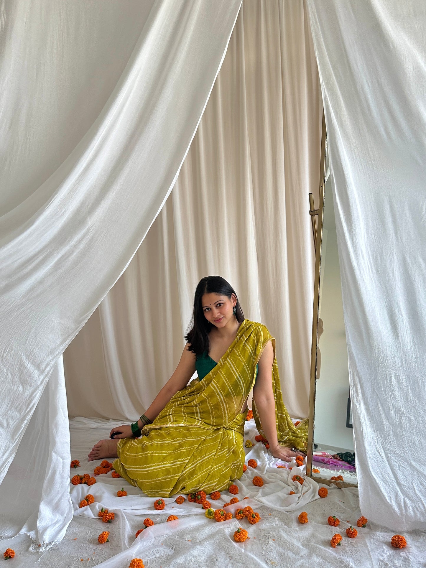 Woman lemon colour leheriya saree
