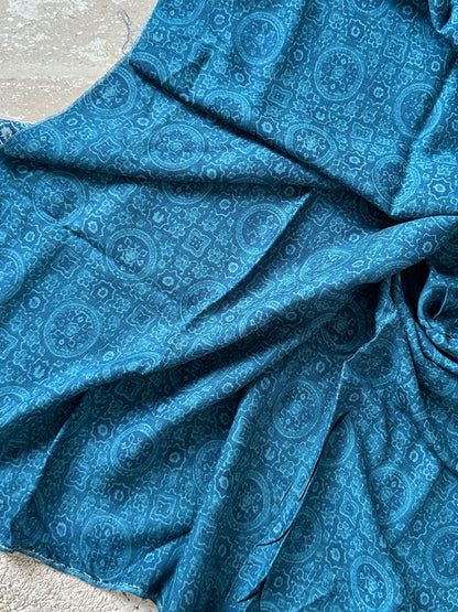 teal-blue-ethnic-motif-printed-cotton-fabric 1